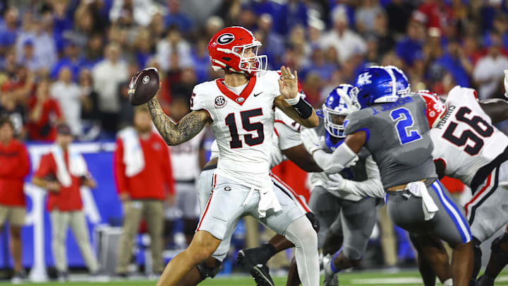 Sep 14, 2024; Lexington, Kentucky, USA; Georgia Bulldogs quarterback Carson Beck (15) drops back to pass against the Kentucky Wildcats during the first quarter at Kroger Field. Mandatory Credit: Carter Skaggs-Imagn Images Sep 14, 2024; Lexington, Kentucky, USA; Georgia Bulldogs quarterback Carson Beck (15) drops back to pass against the Kentucky Wildcats during the first quarter at Kroger Field. Mandatory Credit: Carter Skaggs-Imagn Images