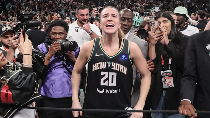 Oct 20, 2024; Brooklyn, New York, USA; New York Liberty guard Sabrina Ionescu (20) celebrates after defeating the Minnesota Lynx in overtime to win the 2024 WNBA Finals at Barclays Center. Mandatory Credit: Wendell Cruz-Imagn Images