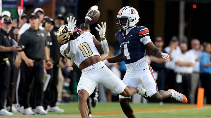 Sep 26, 2026; Auburn, Alabama, USA; Vanderbilt Commodores wide receiver Junior Sherrill (0) makes a catch as Auburn Tigers defensive back Rayshawn Pleasant (4) defends during the fourth quarter at Jordan-Hare Stadium. Mandatory Credit: John Reed-Imagn Images Sep 26, 2026; Auburn, Alabama, USA; Vanderbilt Commodores wide receiver Junior Sherrill (0) makes a catch as Auburn Tigers defensive back Rayshawn Pleasant (4) defends during the fourth quarter at Jordan-Hare Stadium. Mandatory Credit: John Reed-Imagn Images