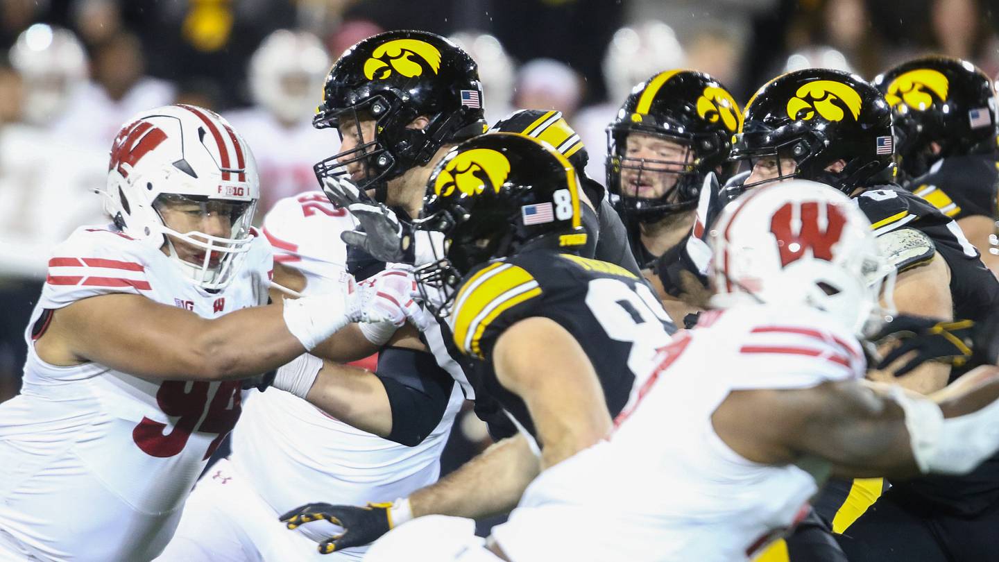 Badger football ends practice in unique fashion and the Iowa Hawkeyes ...