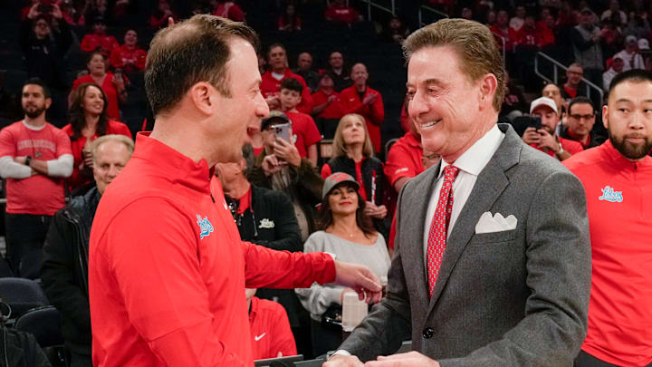 New Mexico v St. John's; Rick Pitino and Richard Pitino embrace before St. John's plays New Mexico at Madison Square Garden