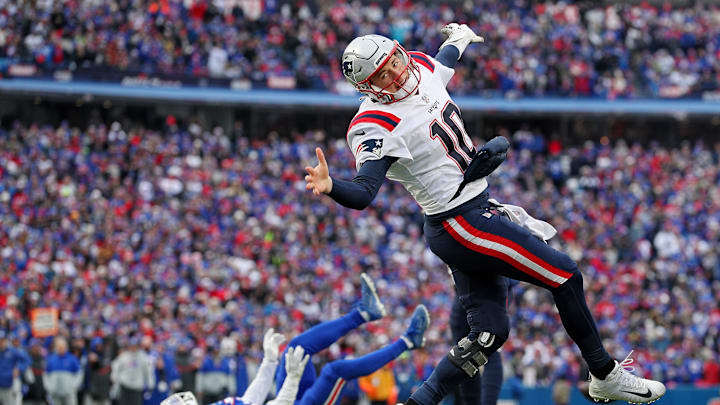 Mac Jones hit vs Bills