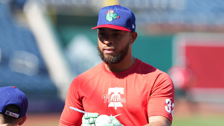 Philadelphia Phillies infielder Edmundo Sosa wearing the Phanatic batting practice hat