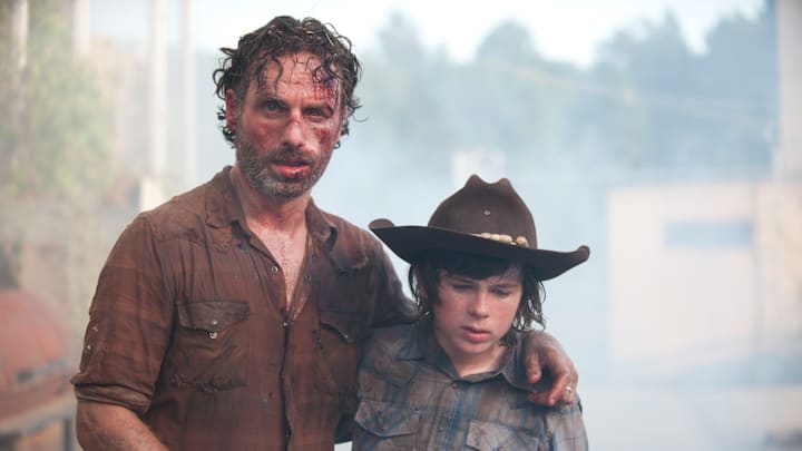 Rick Grimes (Andrew Lincoln) and Carl Grimes (Chandler Riggs) - The Walking Dead _ Season 4, Episode 8 - Photo Credit: Gene Page/AMC