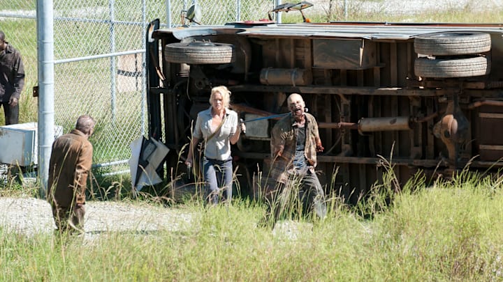 Andrea (Laurie Holden) and Walkers - The Walking Dead_Season 3, Episode 11_"I Ain't a Judas" - Photo Credit: Gene Page/AMC