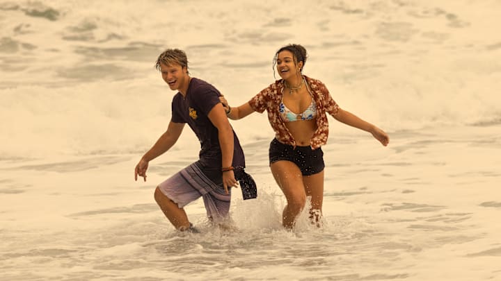 Outer Banks. (L to R) Rudy Pankow as JJ, Madison Bailey as Kiara in episode 403 of Outer Banks. Cr. Jackson Lee Davis/Netflix © 2024