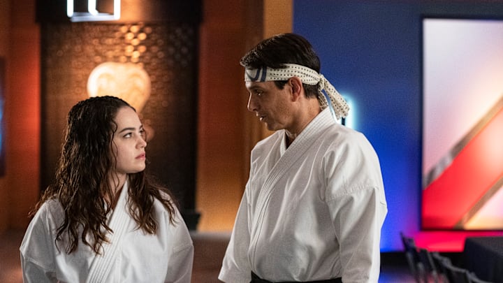 Cobra Kai. (L to R) Mary Mouser as Samantha LaRusso, Ralph Macchio as Daniel LaRusso in episode 508 of Cobra Kai. Cr. Curtis Bonds Baker/Netflix © 2022