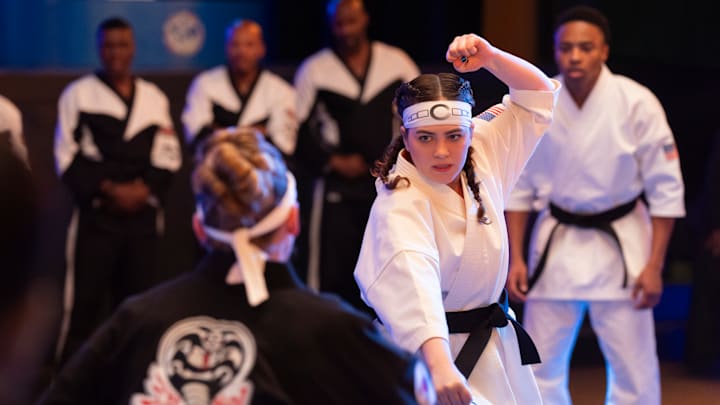 Cobra Kai. (L to R) Mary Mouser as Samantha LaRusso, Dallas Dupree Young as Kenny in Cobra Kai. Cr. Curtis Bonds Baker/Netflix © 2024