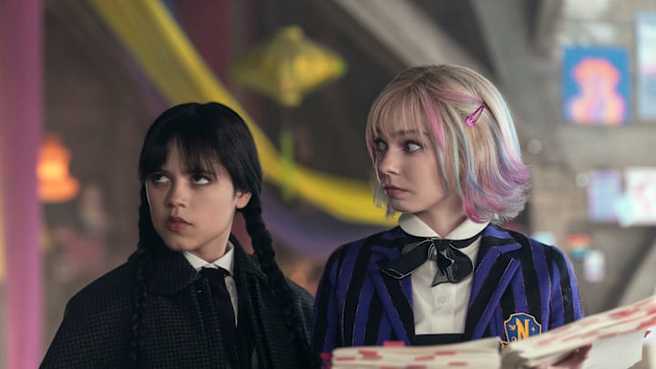 Wednesday. (L to R) Jenna Ortega as Wednesday Addams, Emma Myers as Enid Sinclair in episode 201 of Wednesday. Cr. Jonathan Hession/Netflix © 2025
