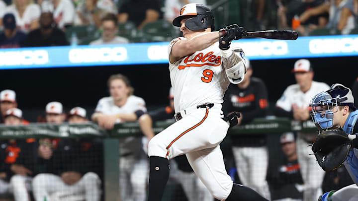 Sep 23, 2025; Baltimore, Maryland, USA; Baltimore Orioles outfielder Tyler O'Neill (9) drives in a run during the first inning against the Tampa Bay Rays at Oriole Park at Camden Yards. Mandatory Credit: Daniel Kucin Jr.-Imagn Images