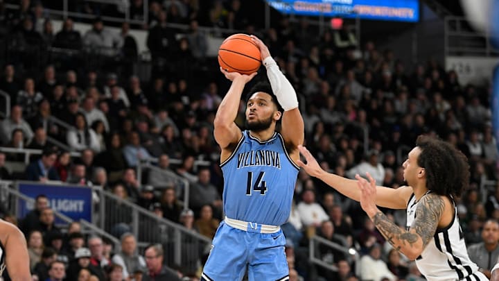Feb 18, 2023; Providence, Rhode Island, USA; Villanova Wildcats guard Caleb Daniels (14) shoots against the Villanova Wildcats during the second half at Amica Mutual Pavilion. Mandatory Credit: Eric Canha-Imagn Images