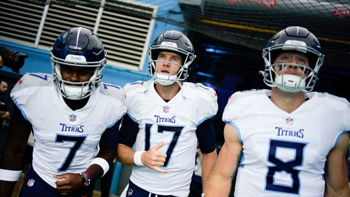 Tennessee Titans quarterbacks Malik Willis (7), Ryan Tannehill (17) and Will Levis (8) head to the