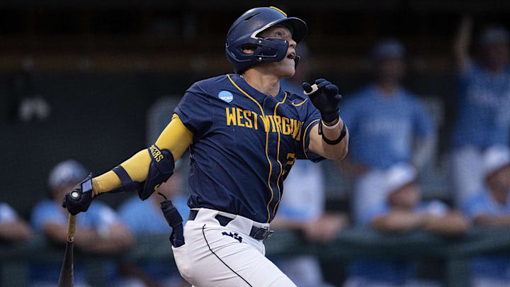 Jun 8, 2024; Chapel Hill, NC, USA; West Virginia Mountaineers JJ Wetherholt (27) bats against the North Carolina Tar Heels in the first inning of the DI Baseball Super Regional at Boshamer Stadium. Mandatory Credit: Jeffrey Camarati-Imagn Images
