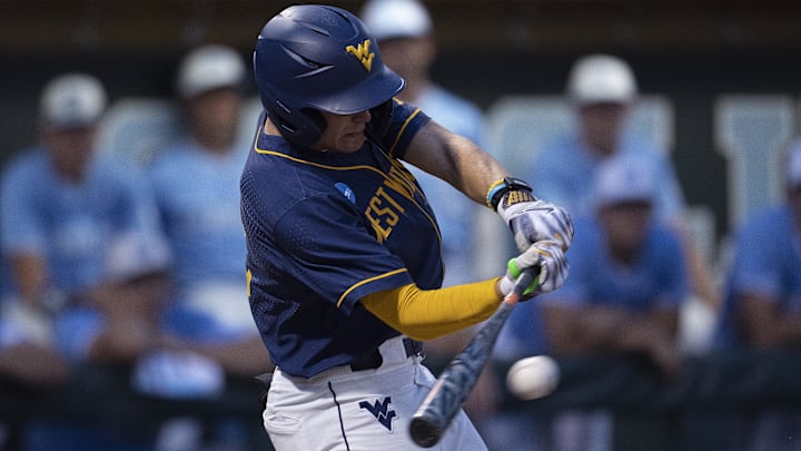 Jun 8, 2024; Chapel Hill, NC, USA; West Virginia Mountaineers Brodie Kresser (12) bats against the North Carolina Tar Heels in the second inning of the DI Baseball Super Regional at Boshamer Stadium. Mandatory Credit: Jeffrey Camarati-Imagn Images