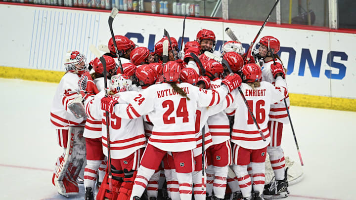 Wisconsin players celebrate after their 4-1 victory over Clarkson in an NCAA regional final March 15, 2025, at LaBahn Arena in Madison, Wisconsin.