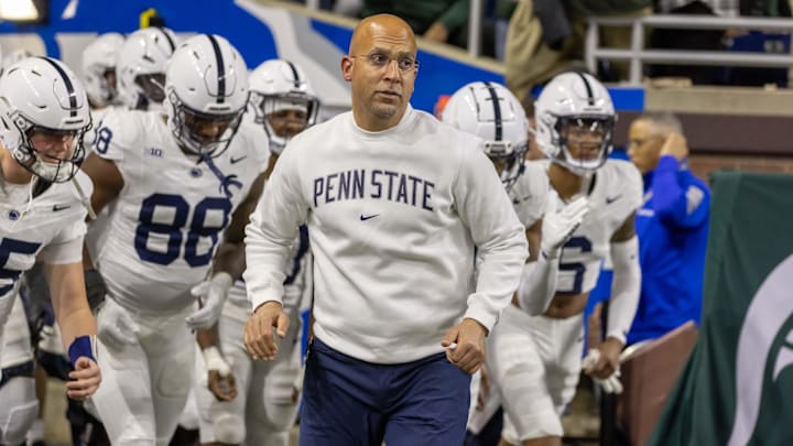 Nov 24, 2023; Detroit, Michigan, USA; Penn State Nittany Lions head coach James Franklin leads his