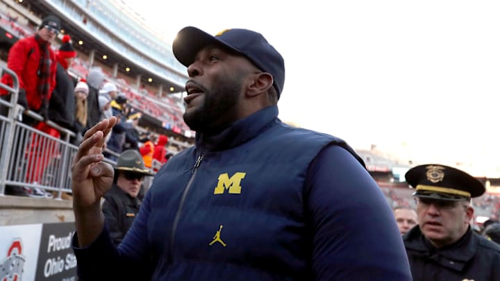Nov 30, 2024; Columbus, Ohio, USA;  Michigan Wolverines head coach Sherrone Moore reacts to fans heckling him after the game against the Ohio State Buckeyes at Ohio Stadium. Mandatory Credit: Joseph Maiorana-Imagn Images