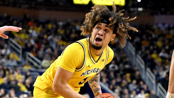 Mar 2, 2025; Ann Arbor, Michigan, USA;  Michigan Wolverines guard Tre Donaldson (3) looks to the basket against the Illinois Fighting Illini in the first half at Crisler Center. Mandatory Credit: Lon Horwedel-Imagn Images