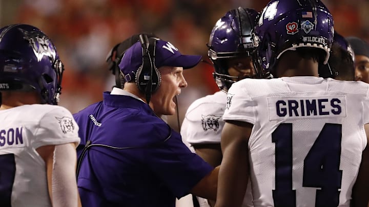 Sep 2, 2021; Salt Lake City, Utah, USA; Weber State Wildcats head coach Jay Hill reacts in the fourth quarter against the Utah Utes at Rice-Eccles Stadium. Mandatory Credit: Jeffrey Swinger-Imagn Images