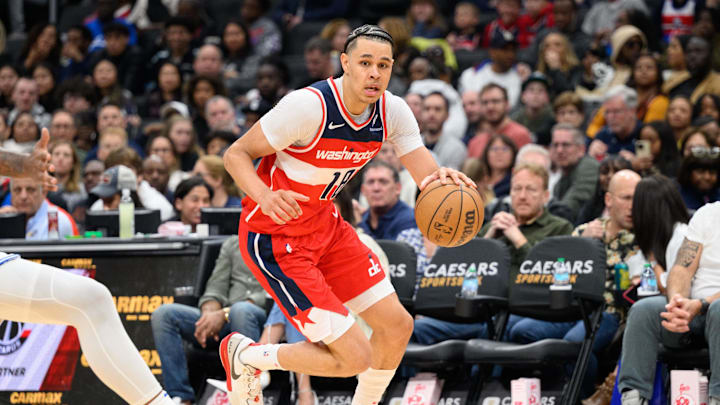 Mar 21, 2025; Washington, District of Columbia, USA; Washington Wizards forward Kyshawn George (18) drives to the basket during the third quarter at Capital One Arena. Mandatory Credit: Reggie Hildred-Imagn Images