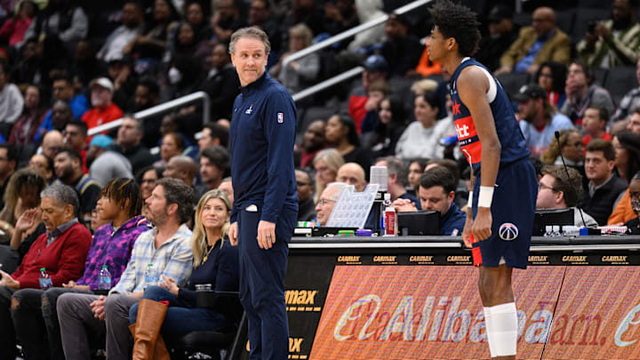 Mar 24, 2025; Washington, District of Columbia, USA; Washington Wizards Brian Keefe looks on during the second quarter as Washington Wizards guard AJ Johnson (5) enters the game at Capital One Arena. Mandatory Credit: Reggie Hildred-Imagn Images