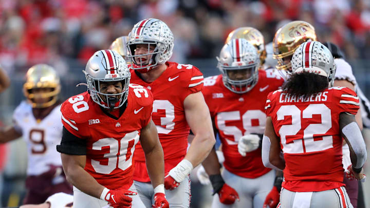 Nov 18, 2023; Columbus, Ohio, USA;  Ohio State Buckeyes linebacker Cody Simon (30) celebrates the tackle for loss during the first quarter against the Minnesota Golden Gophers at Ohio Stadium. Mandatory Credit: Joseph Maiorana-USA TODAY Sports