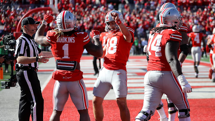 Oct 26, 2024; Columbus, Ohio, USA; Ohio State Buckeyes quarterback Will Howard (18) celebrates a touchdown with running back Quinshon Judkins (1) during the fourth quarter against the Nebraska Cornhuskers at Ohio Stadium. Mandatory Credit: Joseph Maiorana-Imagn Images