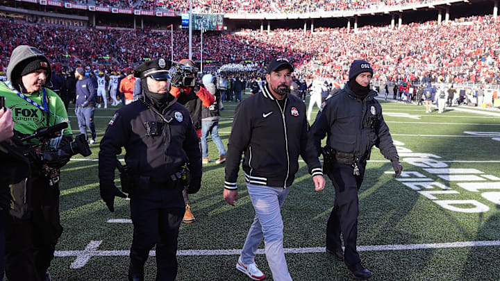 Ohio State Buckeyes head coach Ryan Day walks off the field after losing to Michigan Wolverines 13-10 after the NCAA football game at Ohio Stadium in Columbus on Saturday, Nov. 30, 2024.