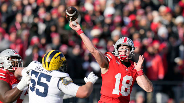 Ohio State Buckeyes quarterback Will Howard (18) throws the ball against Michigan Wolverines during the second quarter of the NCAA football game at Ohio Stadium in Columbus on Saturday, Nov. 30, 2024.