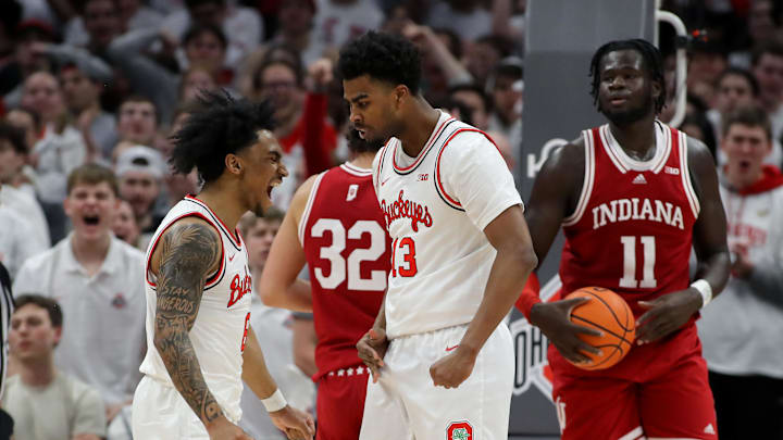 Jan 17, 2025; Columbus, Ohio, USA; Ohio State Buckeyes forward Sean Stewart (13) celebrates a basket with guard Ques Glover (6) during the first half against the Indiana Hoosiers at Value City Arena. Mandatory Credit: Joseph Maiorana-Imagn Images