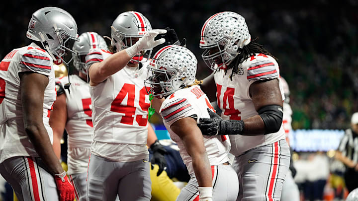 Ohio State Buckeyes running back Quinshon Judkins (1) scores a rushing touchdown against Notre Dame Fighting Irish in the third quarter during the College Football Playoff National Championship at Mercedes-Benz Stadium in Atlanta on January 20, 2025