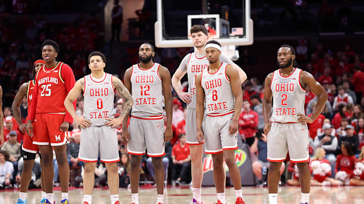 Feb 6, 2025; Columbus, Ohio, USA;  Ohio State Buckeyes guard John Mobley Jr. (0), guard Evan Mahaffey (12), center Ivan Njegovan (17), guard Micah Parrish (8) and guard Bruce Thornton (2) watch a technical foul shot during the first half against the Maryland Terrapins at Value City Arena. Mandatory Credit: Joseph Maiorana-Imagn Images