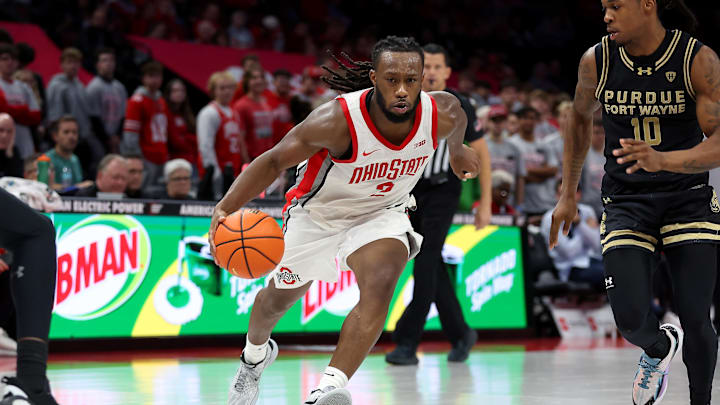 Nov 7, 2025; Columbus, Ohio, USA;  Ohio State Buckeyes guard Bruce Thornton (2) drives to the basket as Purdue Fort Wayne Mastodons guard Corey Hadnot II (10) defends during the second half at Value City Arena. Mandatory Credit: Joseph Maiorana-Imagn Images