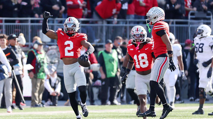 Nov 1, 2025; Columbus, Ohio, USA; Ohio State Buckeyes defensive back Caleb Downs (2) celebrates his interception during the fourth quarter against the Penn State Nittany Lions at Ohio Stadium. Mandatory Credit: Joseph Maiorana-Imagn Images Nov 1, 2025; Columbus, Ohio, USA; Ohio State Buckeyes defensive back Caleb Downs (2) celebrates his interception during the fourth quarter against the Penn State Nittany Lions at Ohio Stadium. Mandatory Credit: Joseph Maiorana-Imagn Images