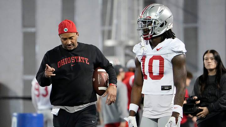 Mar 9, 2023; Columbus, Ohio, USA;  Ohio State Buckeyes cornerback Denzel Burke (10) works with secondary coach Tim Walton during spring football practice at the Woody Hayes Athletic Center. Mandatory Credit: Adam Cairns-The Columbus Dispatch

Football Buckeyes Spring Football