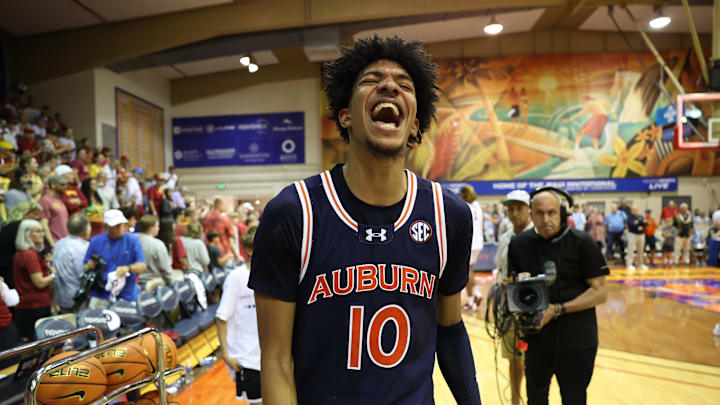 Nov 25, 2024; Lahaina, Hawaii, USA;  Auburn Tigers guard Chad Baker-Mazara (10) reacts after the Tigers defeated the Iowa State Cyclones at the end of an NCAA college basketball game at Lahaina Civic Center. Auburn defeated Iowa State 83-81. Mandatory Credit: Marco Garcia-Imagn Images