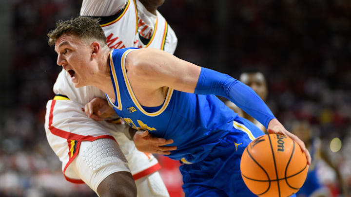 Jan 10, 2025; College Park, Maryland, USA; UCLA Bruins forward William Kyle III (24) drives to the basket during the first half against the Maryland Terrapins at Xfinity Center. Mandatory Credit: Reggie Hildred-Imagn Images