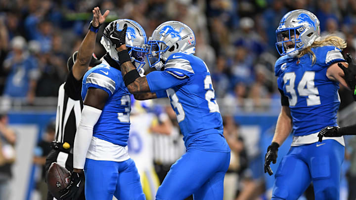 Sep 8, 2024; Detroit, Michigan, USA; Detroit Lions safety Kerby Joseph (31) celebrates with cornerback Carlton Davis III (23) after intercepting Los Angeles Rams quarterback Matthew Stafford (not pictured) in the end zone at the end of the first half at Ford Field. Mandatory Credit: Lon Horwedel-Imagn Images