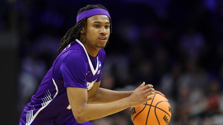 Mar 20, 2026; Philadelphia, PA, USA; Furman Paladins guard Alex Wilkins (10) dribbles the ball against the UConn Huskies in the second half during a first round game of the men's 2026 NCAA Tournament at Xfinity Mobile Arena. Mandatory Credit: Bill Streicher-Imagn Images