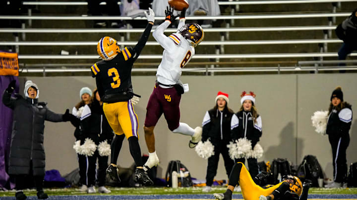 A pass to Walsh Jesuit’s Milan Parris (8) is broken up by Avon’s Jonathan Scott (3) in an OHSAA DII state semifinal, Nov. 28, 2025, at InfoCision Stadium in Akron, Ohio.