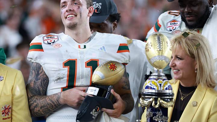 Jan 8, 2026; Glendale, AZ, USA; Miami (FL) Hurricanes quarterback Carson Beck (11) reacts after defeating the Mississippi Rebels during the 2026 Fiesta Bowl and semifinal game of the College Football Playoff at State Farm Stadium. Mandatory Credit: Mark J. Rebilas-Imagn Images Jan 8, 2026; Glendale, AZ, USA; Miami (FL) Hurricanes quarterback Carson Beck (11) reacts after defeating the Mississippi Rebels during the 2026 Fiesta Bowl and semifinal game of the College Football Playoff at State Farm Stadium. Mandatory Credit: Mark J. Rebilas-Imagn Images