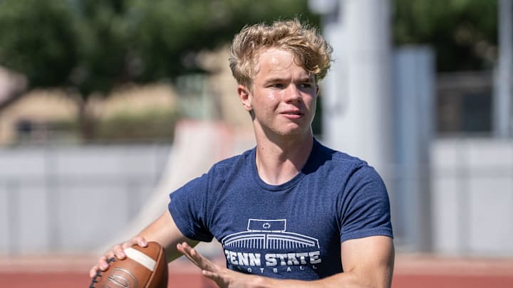 Higley High School quarterback Luke Haugo practices during spring training on campus in Gilbert on May 4, 2023.