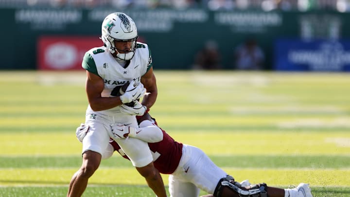 Aug 23, 2025; Honolulu, Hawaii, USA;  Stanford Cardinal cornerback Aaron Morris (31) wraps up Hawaii Rainbow Warriors wide receiver Jackson Harris (9) during the second half at Clarence T.C. Ching Athletics Complex. Mandatory Credit: Marco Garcia-Imagn Images