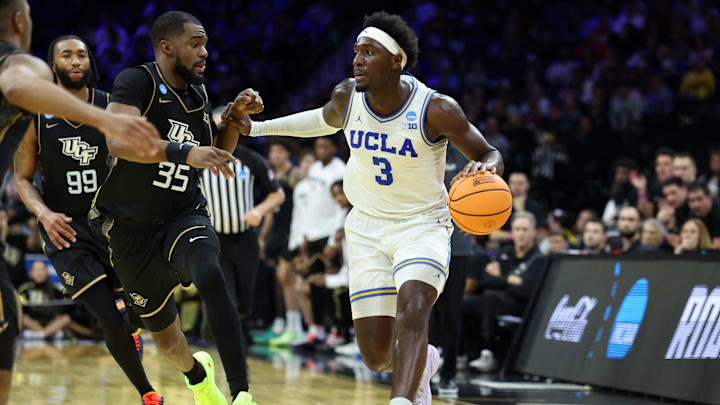 Mar 20, 2026; Philadelphia, PA, USA; UCLA Bruins forward Eric Dailey Jr. (3) dribbles the ball against the UCF Knights in the second half during a first round game of the men's 2026 NCAA Tournament at Xfinity Mobile Arena. Mandatory Credit: Bill Streicher-Imagn Images