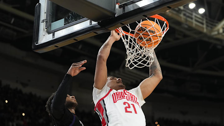 Mar 19, 2026; Greenville, SC, USA; Ohio State Buckeyes forward Devin Royal (21) dunks the ball against the Texas Christian University Horned Frogs in the second half during a first round game of the men's 2026 NCAA Tournament at Bon Secours Wellness Arena. Mandatory Credit: Bob Donnan-Imagn Images