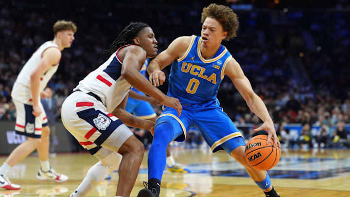 Mar 22, 2026; Philadelphia, PA, USA; UCLA Bruins guard Trent Perry (0) dribbles the ball against the UConn Huskies in the first half during a second round game of the men's 2026 NCAA Tournament at Xfinity Mobile Arena. Mandatory Credit: Kyle Ross-Imagn Images