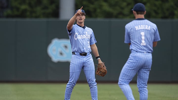 Jun 2, 2024; Chapel Hill, NC, USA; North Carolina Tar Heels infielder Colby Wilkerson (3) points to first base after making an out against the Louisiana State Tigers during the Div. I NCAA baseball regional at Boshamer Stadium.  Mandatory Credit: Jeffrey Camarati-USA TODAY Sports

