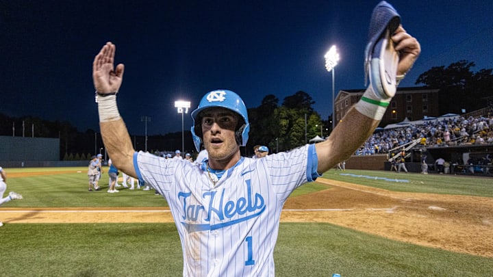 Jun 7, 2024; Chapel Hill, NC, USA; North Carolina Tar Heels Alex Madera (1) celebrates his team’s win over the West Virginia Mountaineers in the DI Baseball Super Regional at Boshamer Stadium.  Mandatory Credit: Jeffrey Camarati-Imagn Images
