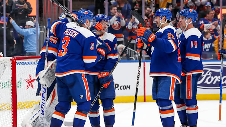 Apr 6, 2024; Elmont, New York, USA; New York Islanders celebrate after the game against the