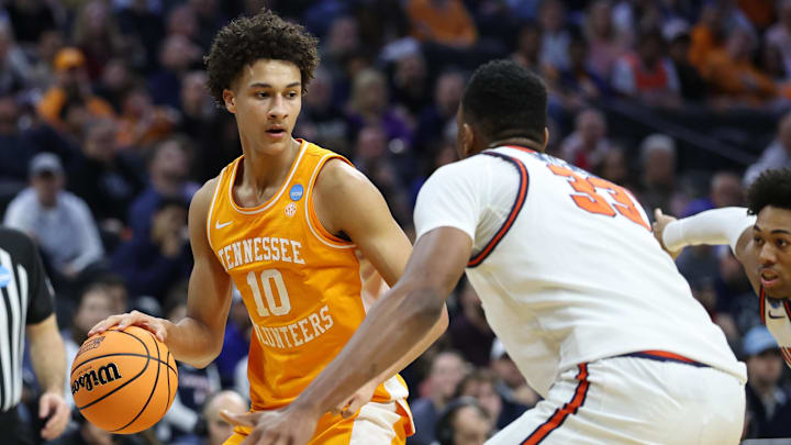 Mar 22, 2026; Philadelphia, PA, USA; Tennessee Volunteers forward Nate Ament (10) dribbles the ball against Virginia Cavaliers center Ugonna Onyenso (33) in the first half during a second round game of the men's 2026 NCAA Tournament at Xfinity Mobile Arena. Mandatory Credit: Bill Streicher-Imagn Images Mar 22, 2026; Philadelphia, PA, USA; Tennessee Volunteers forward Nate Ament (10) dribbles the ball against Virginia Cavaliers center Ugonna Onyenso (33) in the first half during a second round game of the men's 2026 NCAA Tournament at Xfinity Mobile Arena. Mandatory Credit: Bill Streicher-Imagn Images